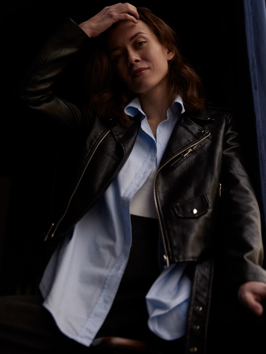 Woman in a black leather jacket