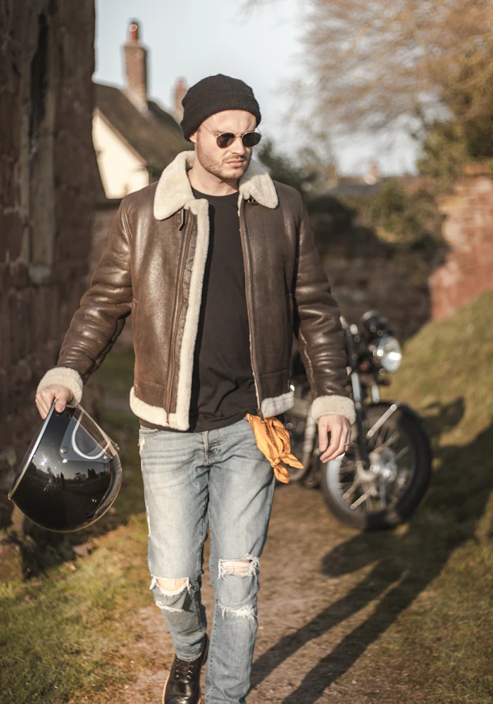 Man in a brown shearling jacket